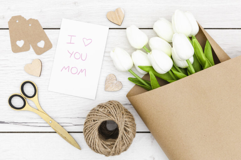 top-view-white-tulips-wooden-table